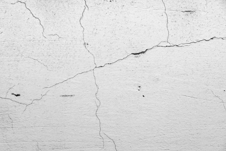 Why Are There Cracks in Concrete? Learn the Real Reason